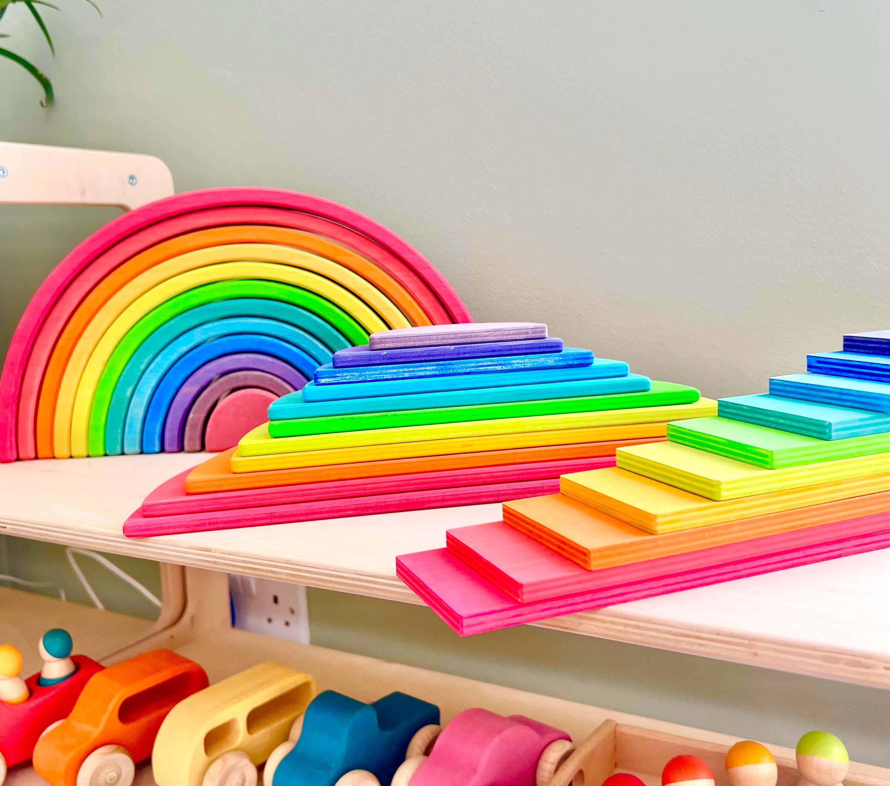 Colourful wooden rainbow stacker toy for open-ended play