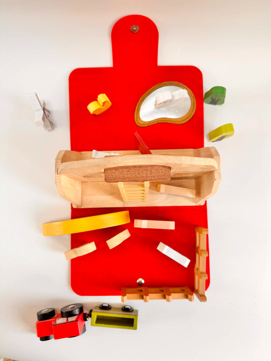 Colorful wooden toy farm set with vehicle, accessories, and a detailed farm scene for imaginative play.