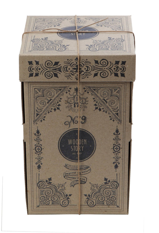 Eco-friendly kraft box packaging for Wooden Story toys, featuring intricate designs and a natural twine closure.