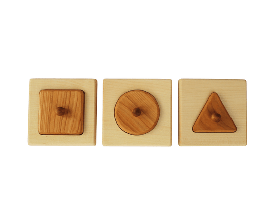 Montessori geometric shape puzzle featuring square, circle, and triangle on a wooden base for fine motor skill development.