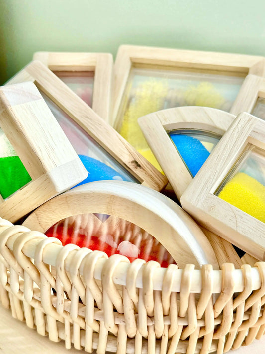 Montessori-inspired eco-friendly wooden sand blocks for open-ended play in a wicker basket