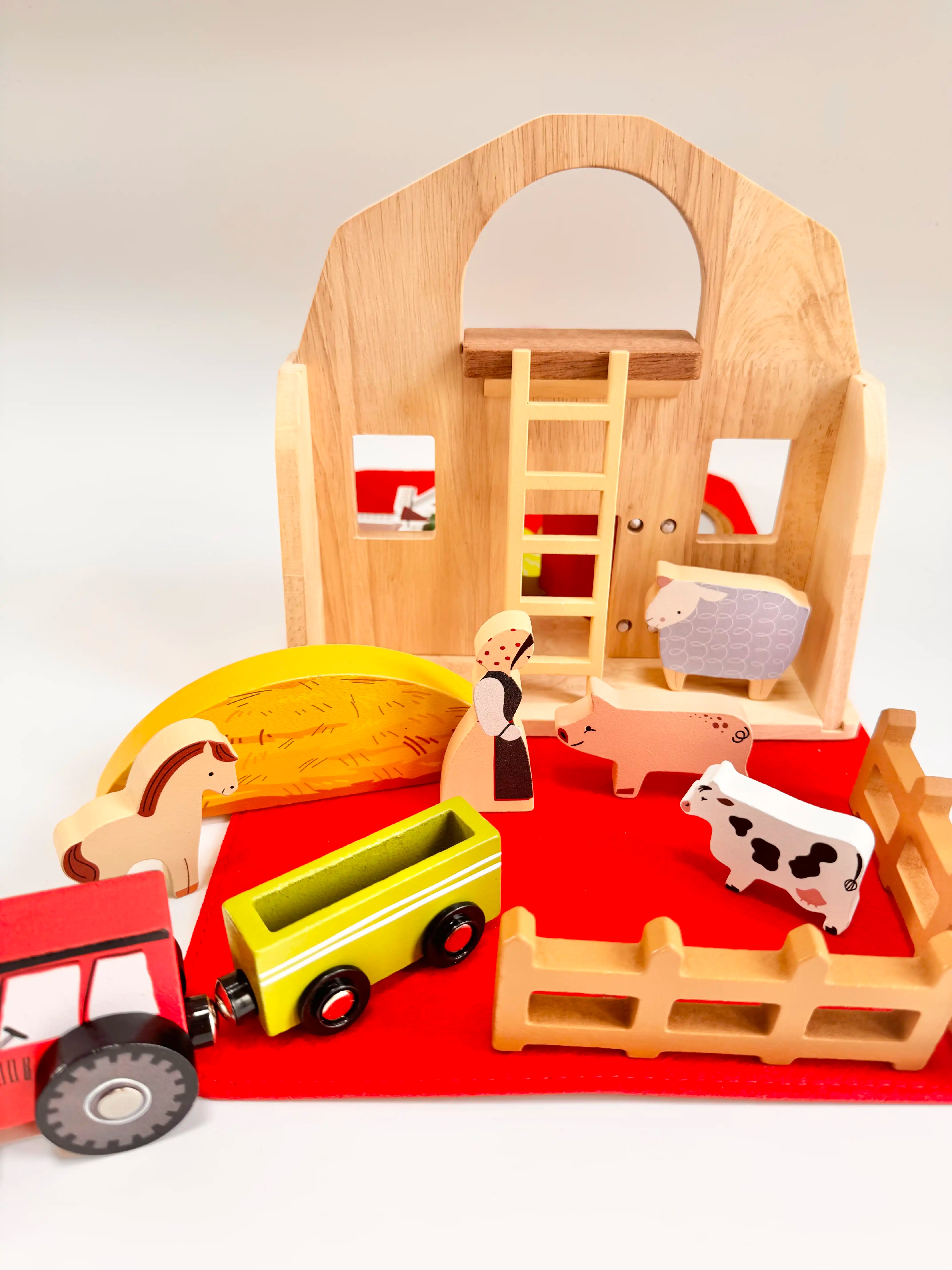 Folding Wooden Farmyard House toy set with animals and tractor, perfect for imaginative play for toddlers.