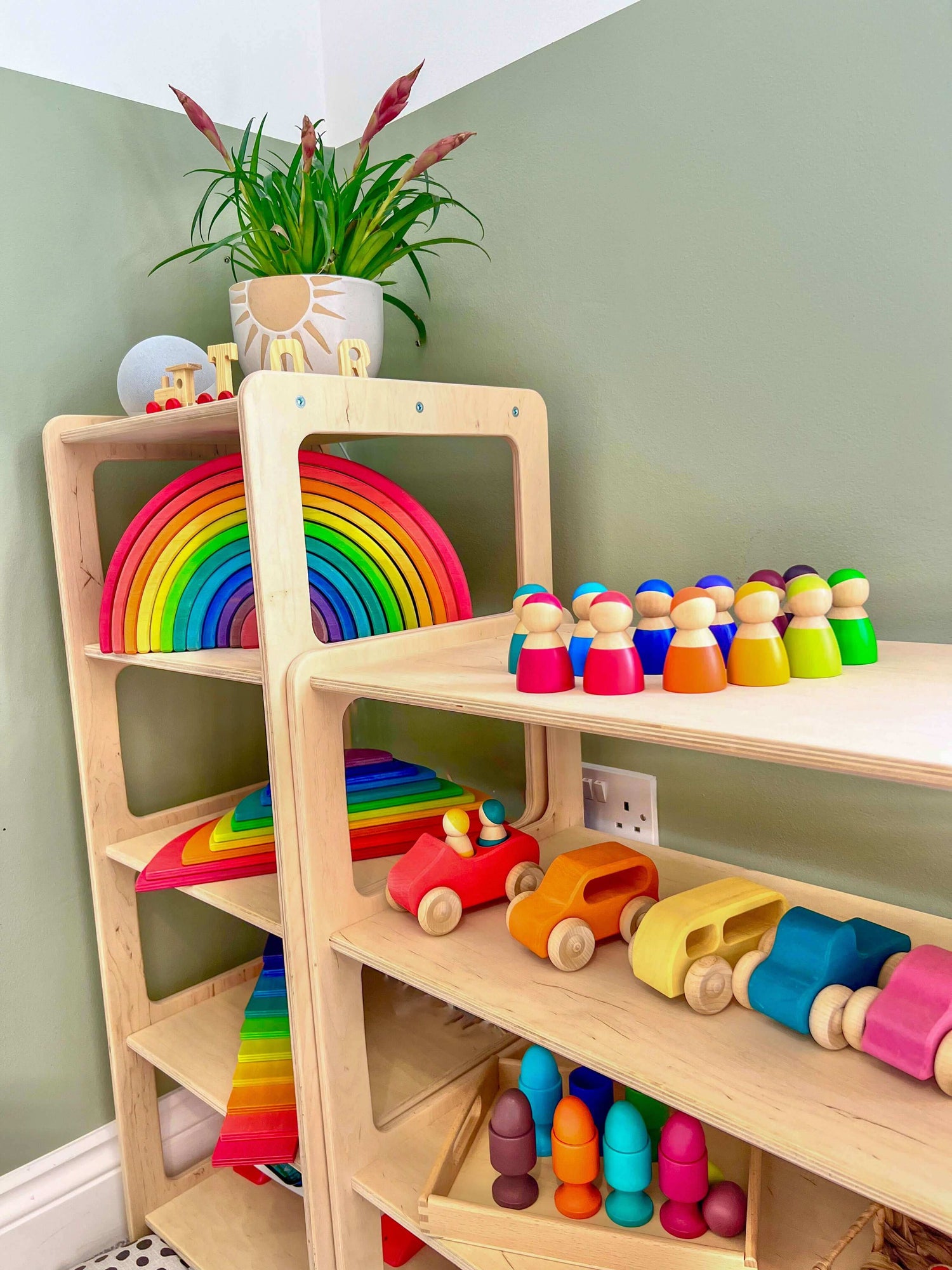 A toy shelf with toys designed for open ended play