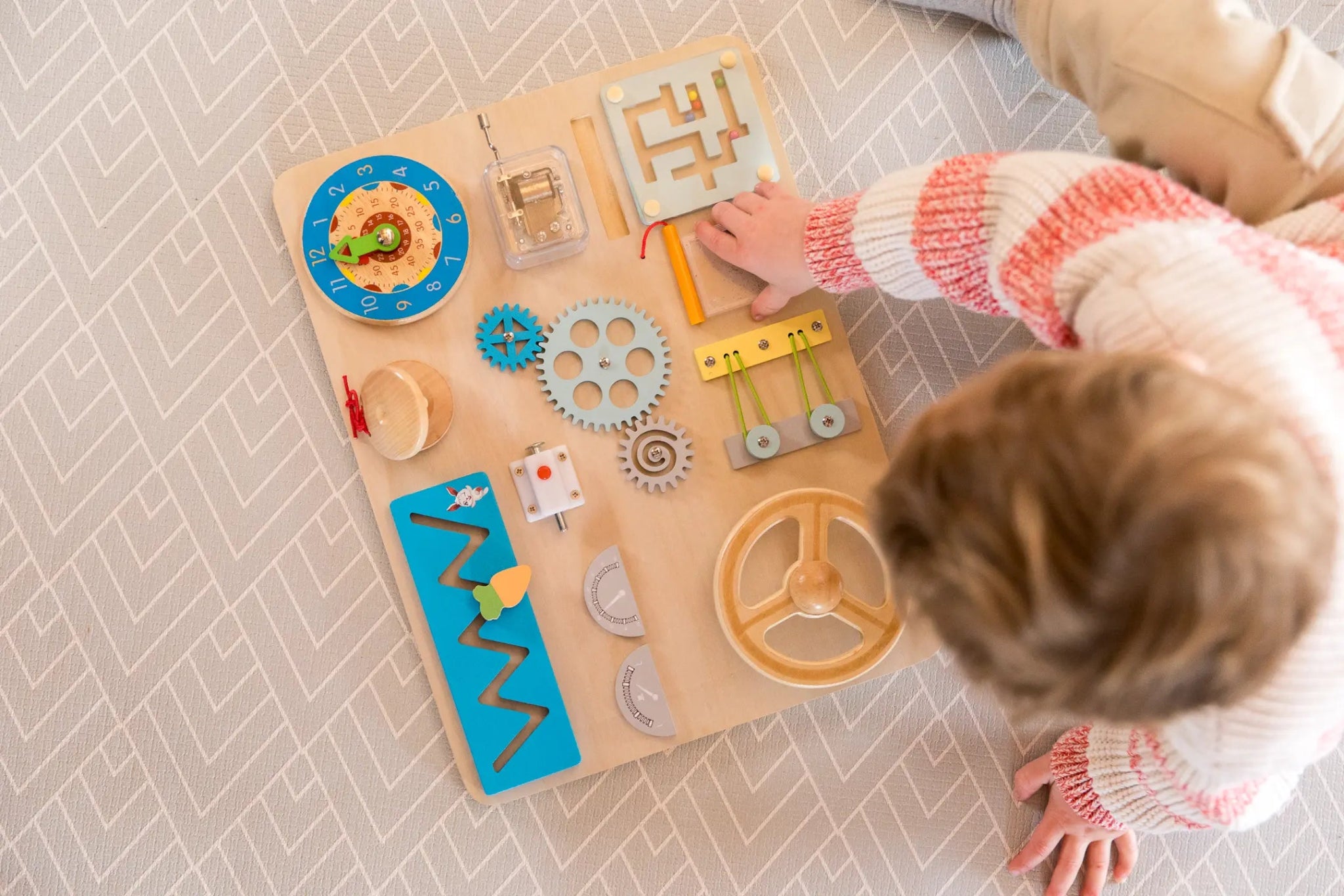Wooden Busy Board for Toddlers with a Steering Wheel