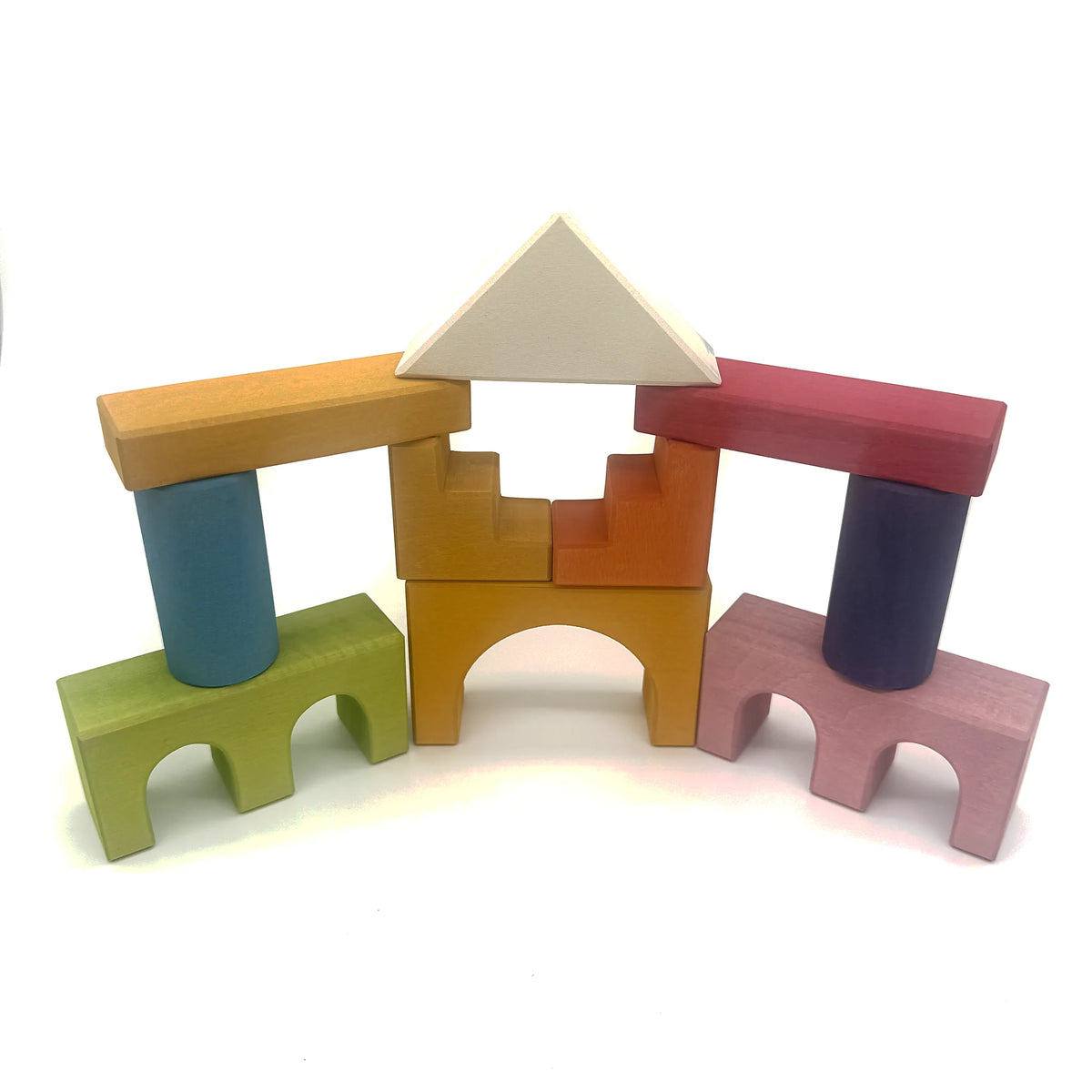 Colourful wooden architectural blocks arranged as a castle bridge