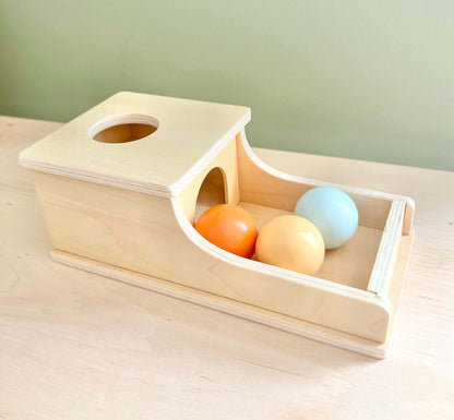 Eco-friendly wooden object permanence ball drop for Montessori-inspired, open-ended play and learning