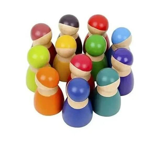 Set of 12 wooden painted rainbow peg people for Montessori inspired open-ended play